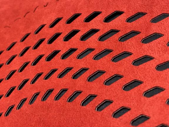 Red laser cut fabric for McLaren