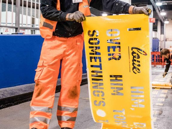 Virgin Trains Christmas Campaign stencils being applied to train platform