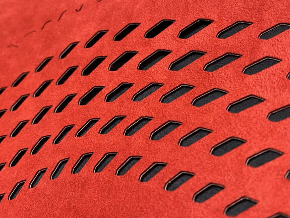 Red laser cut fabric for McLaren