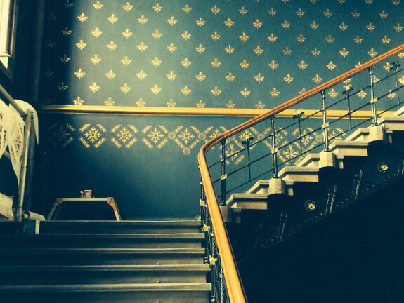 Grand staircase with stencilled walls in Glasgow