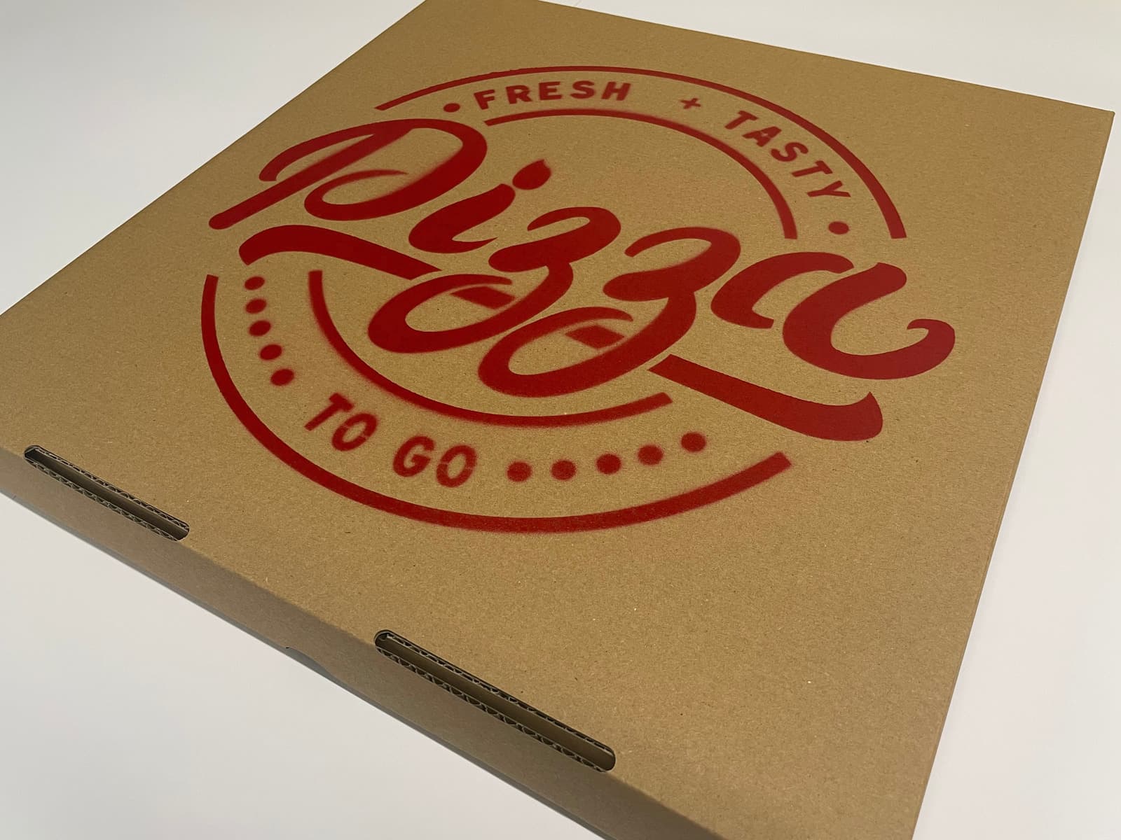 Pizza box with Fresh + Tasty logo