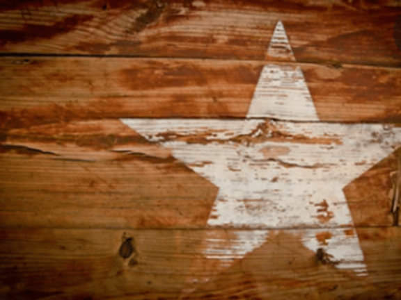 White star stencilled onto floorboards